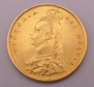 An 1887 gold half sovereign.