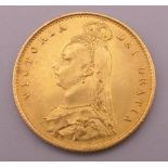 An 1887 gold half sovereign.