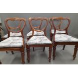 A set of Six Victorian balloon back dining chairs.