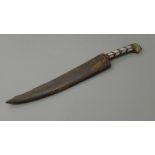 A mother-of-pearl handled dagger in leather sheath. 30.5 cm long.