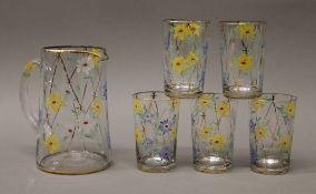 A painted glass lemonade set.