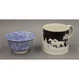 A Victorian hunt mug, and a blue and white bowl. The former 13 cm high.