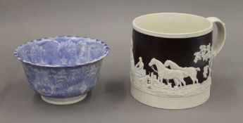 A Victorian hunt mug, and a blue and white bowl. The former 13 cm high.