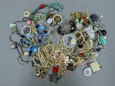 A tray of various costume jewellery.