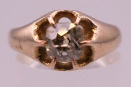 An unmarked gold, possibly 18 ct gold, bi-colour tourmaline ring. Ring size Q. 4.