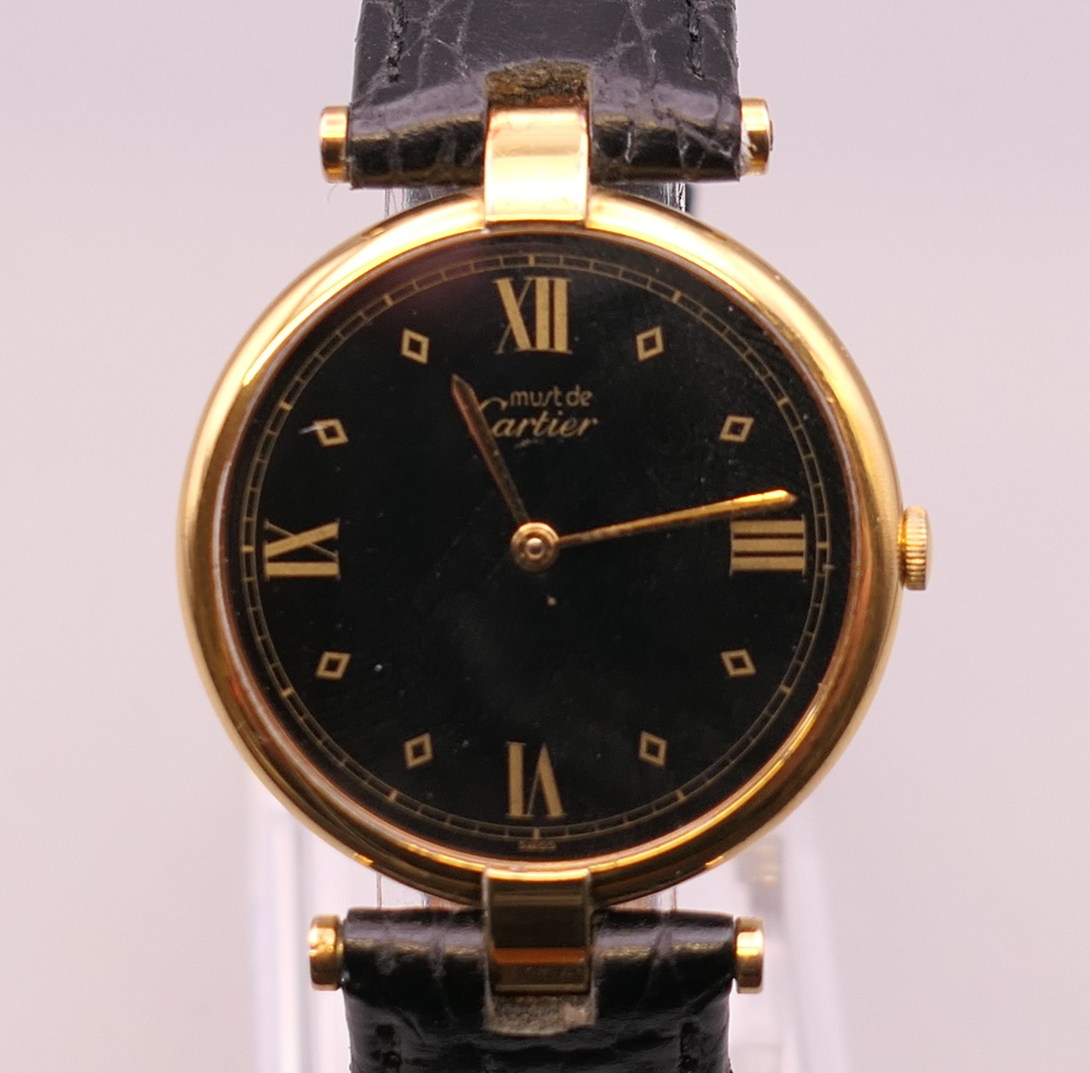 A Must de Cartier gold Vermeil gentlemen's wristwatch. 3 cm wide.