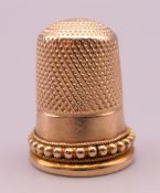 An unmarked gold thimble. 6.5 grammes.