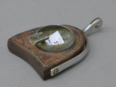 A vintage stirrup form ashtray. 13 cm long.