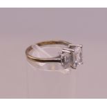 A 9 ct white gold dress ring. Ring size K/L. 2.1 grammes total weight.