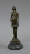 A bronze model of a singing girl. 18.5 cm high.