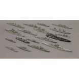 A quantity of die cast model war ships. The largest 18.5 cm long.
