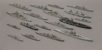 A quantity of die cast model war ships. The largest 18.5 cm long.