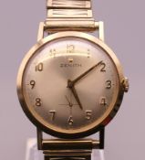 A 9 ct gold cased Zenith gentlemen's wristwatch on a plated strap. 3.5 cm wide.