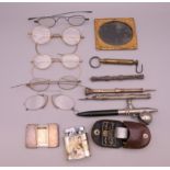 A quantity of miscellaneous items, including propelling pencils, spectacles, etc.