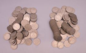 A quantity of two shilling pieces - 82 x 1962 and 93 x 1961.