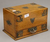 A Victorian oak stationery box. 31 cm wide.