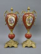 A pair of gilt metal mounted porcelain vases. 47 cm high.