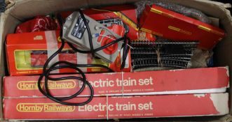 A quantity of Hornby OO Gauge train sets and accessories.