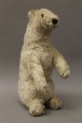 A vintage cuddly polar bear. 45 cm high.