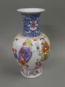 A Chinese porcelain vase decorated with figures. 37 cm high.