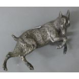 A silver plated model of a goat. 12 cm long.