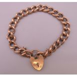 A 9 ct gold bracelet with padlock clasp. 12.9 grammes.