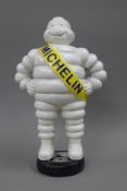 A cast iron Michelin Man. 37 cm high.