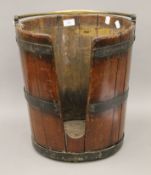 A 19th century brass bound plate bucket.