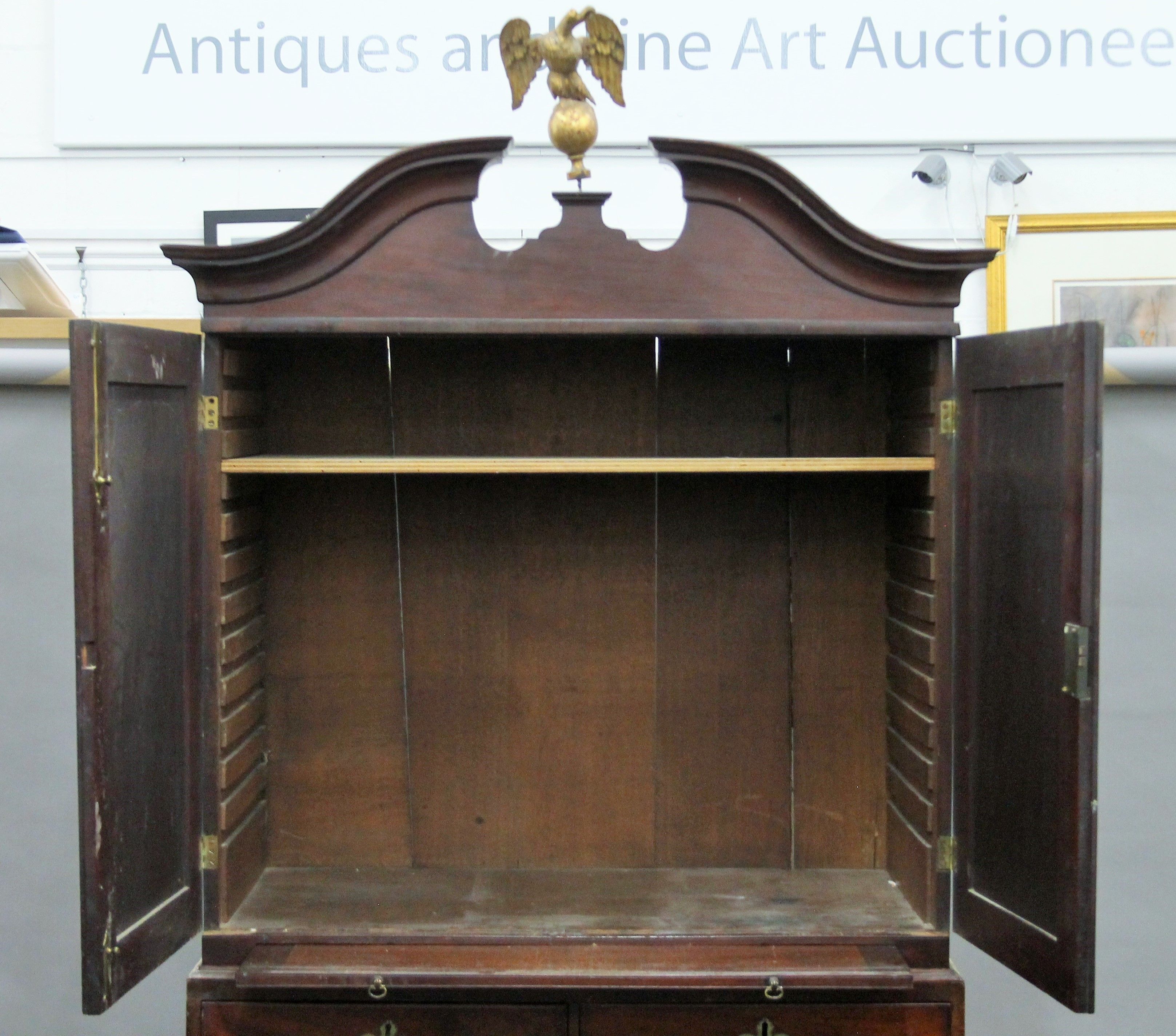 A Georgian mahogany linen press with gilt eagle surmount. Approximately 220 cm high x 118 cm wide. - Image 3 of 10