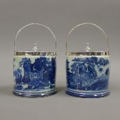 Two porcelain biscuit barrels. 19 cm high.