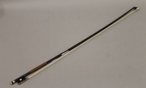 A Tourte violin bow. 73 cm long. Note: This lot has a current ivory exemption certificate.