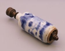 A Chinese blue and white porcelain snuff bottle fitted as a finial. 10 cm high overall.
