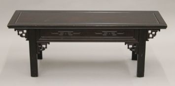 A Chinese low table. 110 cm long.