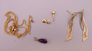 A 9 ct gold chain (broken), a pair of gold earrings (broken) and a pendant. 5.