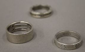 Three gentleman's rings.