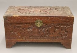 An Eastern carved trunk. 88 cm wide.