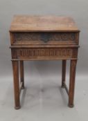 An 18th century and later oak bible box on stand. 69 cm wide.