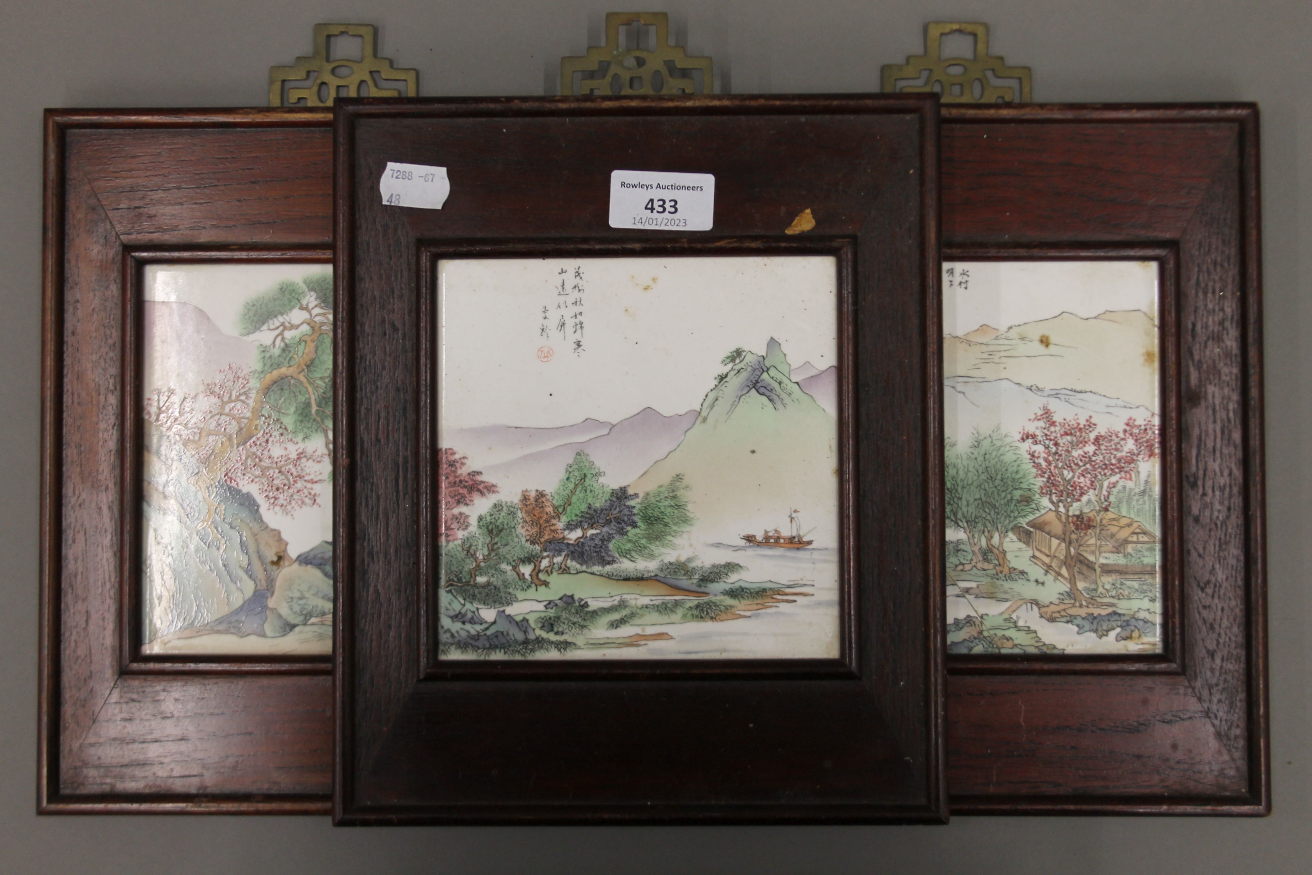 Three framed Chinese porcelain plaques. Each 22 x 26.5 cm overall.