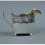 A George III Irish silver cream jug. 10.5 cm high. 183.1 grammes.