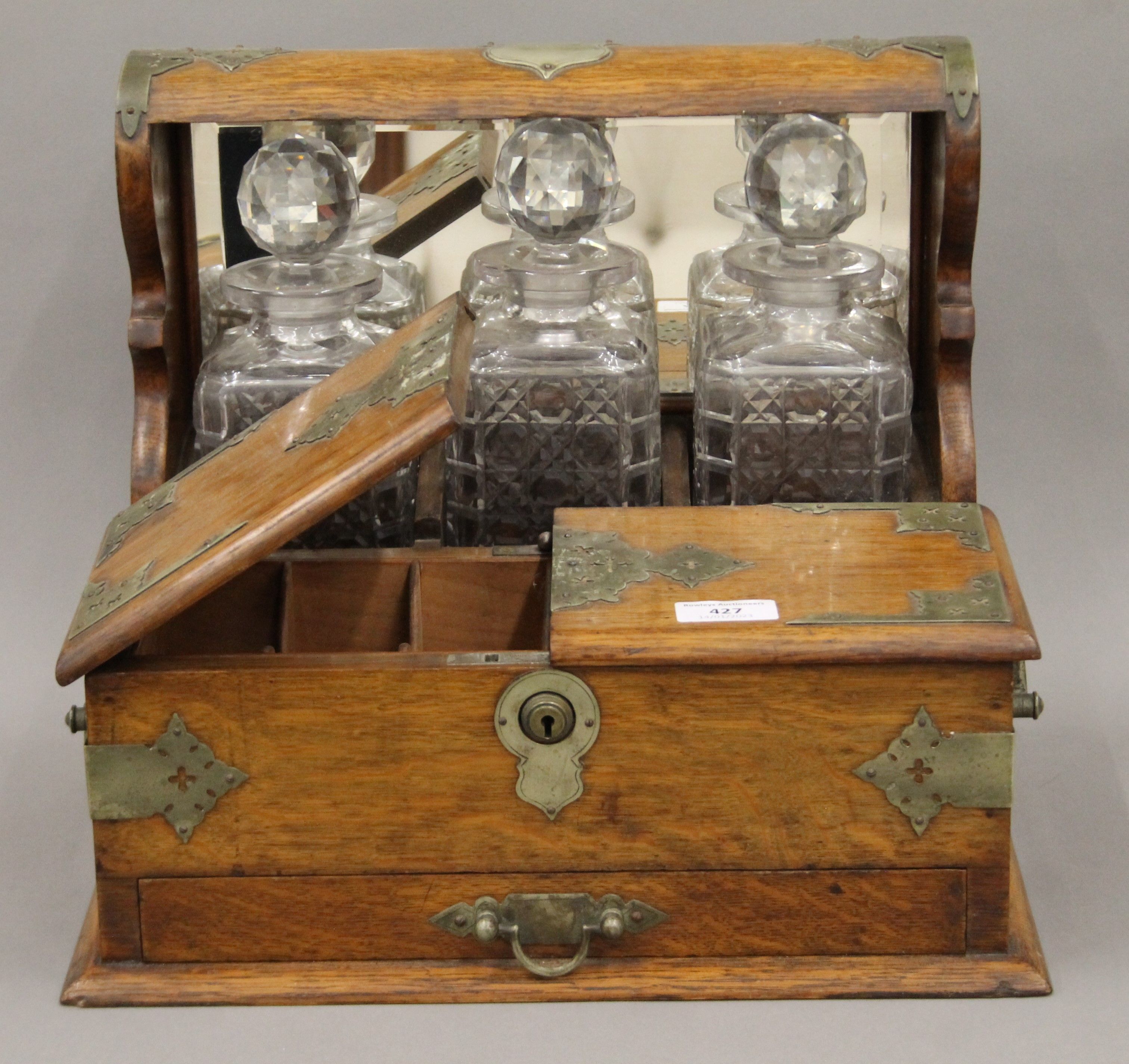 A Victorian silver plate mounted oak games box tantalus. 37 cm wide. - Image 2 of 5
