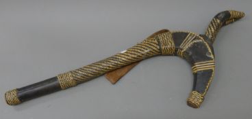 An unusual tribal woven leather club/sceptre formed as an antelope. 64 cm high.