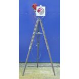 A vintage tripod stage light. 151 cm high.