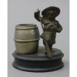 A Victorian table vesta surmounted with a girl and an oar. 9.25 cm high.