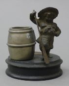 A Victorian table vesta surmounted with a girl and an oar. 9.25 cm high.