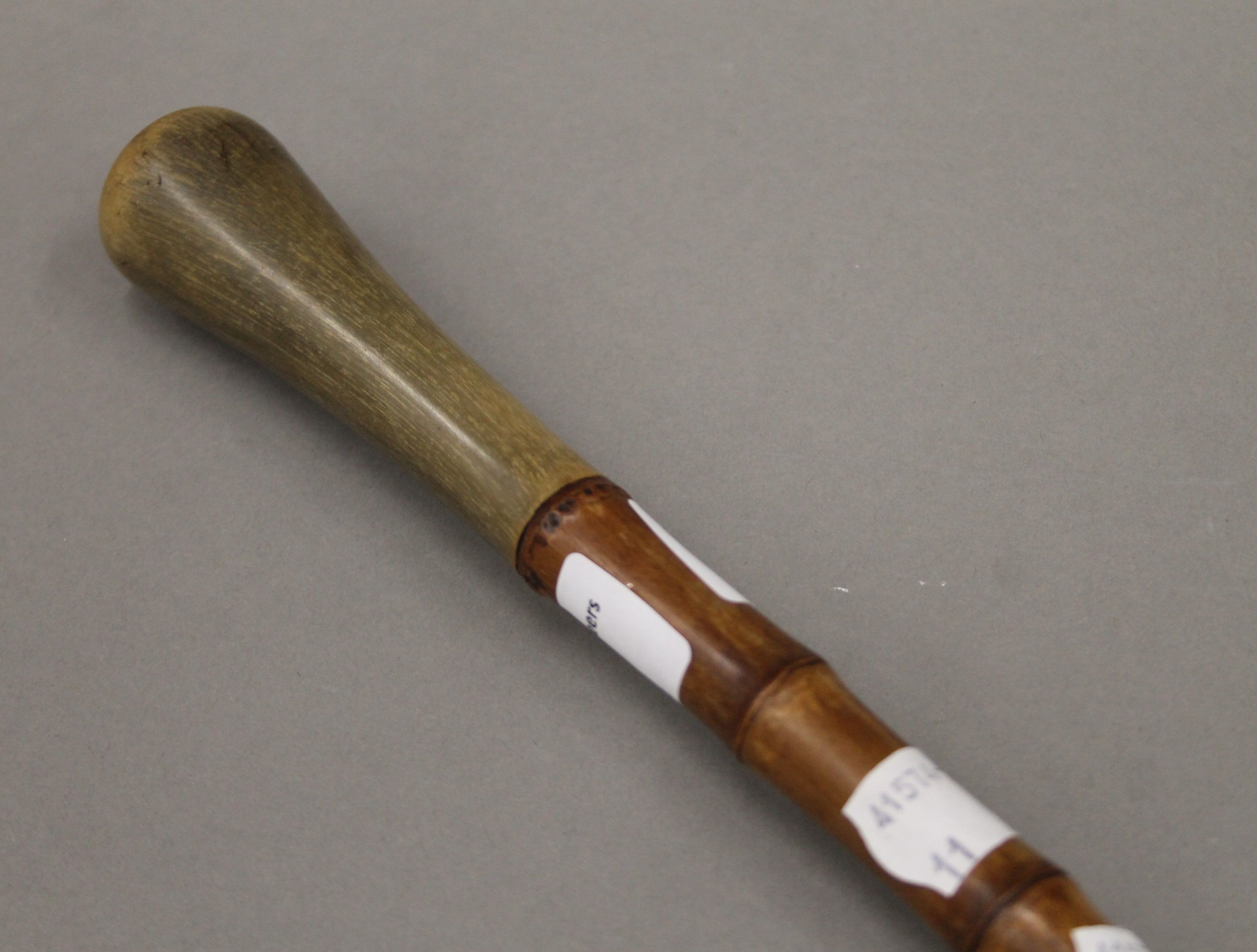 A 19th century bamboo walking cane, the handle possibly rhino horn. 79 cm long. - Image 3 of 3