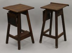 A pair of oak Art Student tables. 74 cm high.