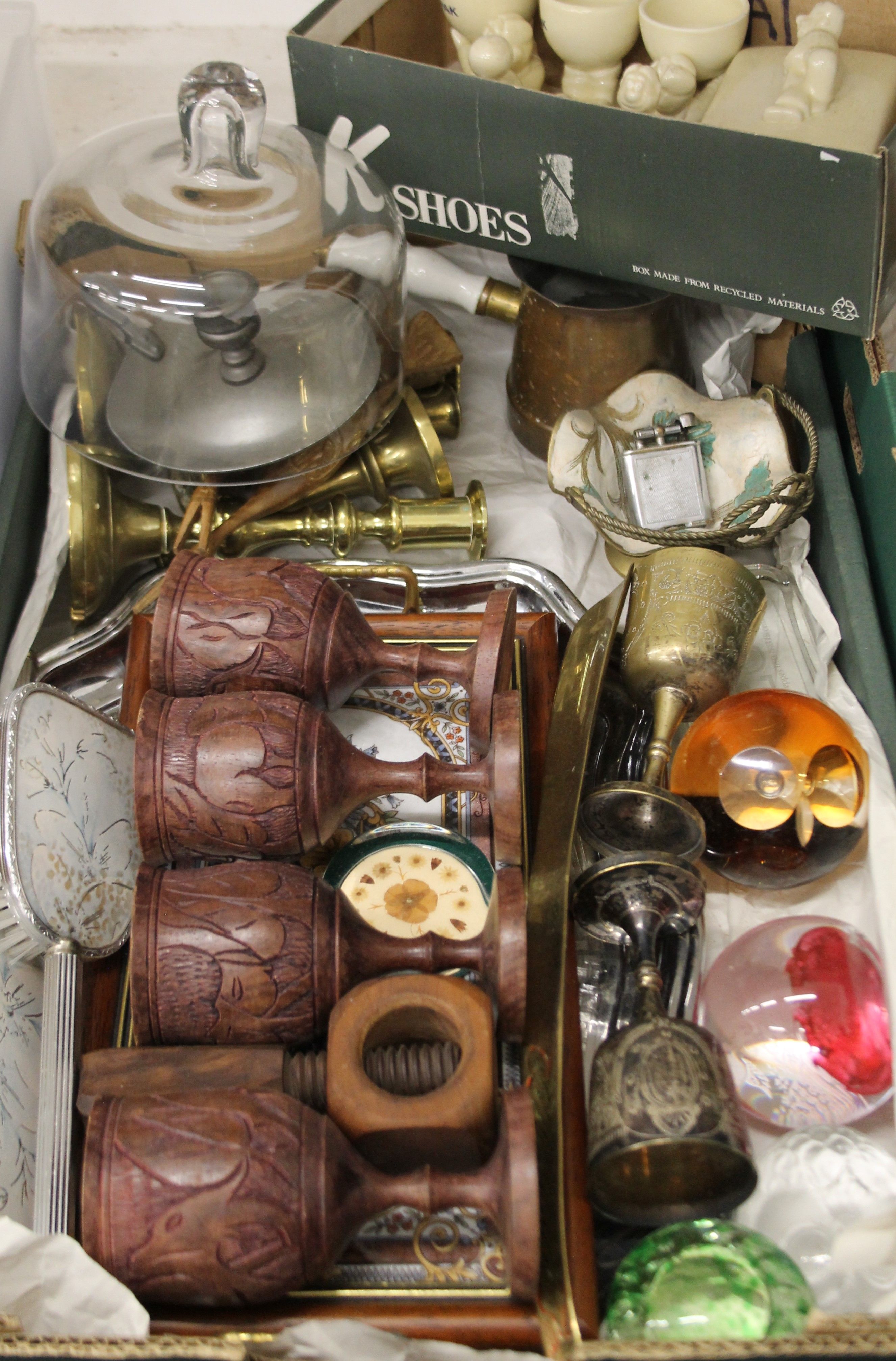 A box of miscellaneous items, including treen cups, metalware, paperweights, etc.