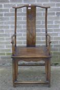 A late 19th/early 20th century Chinese elm splat back armchair. 59 cm wide.