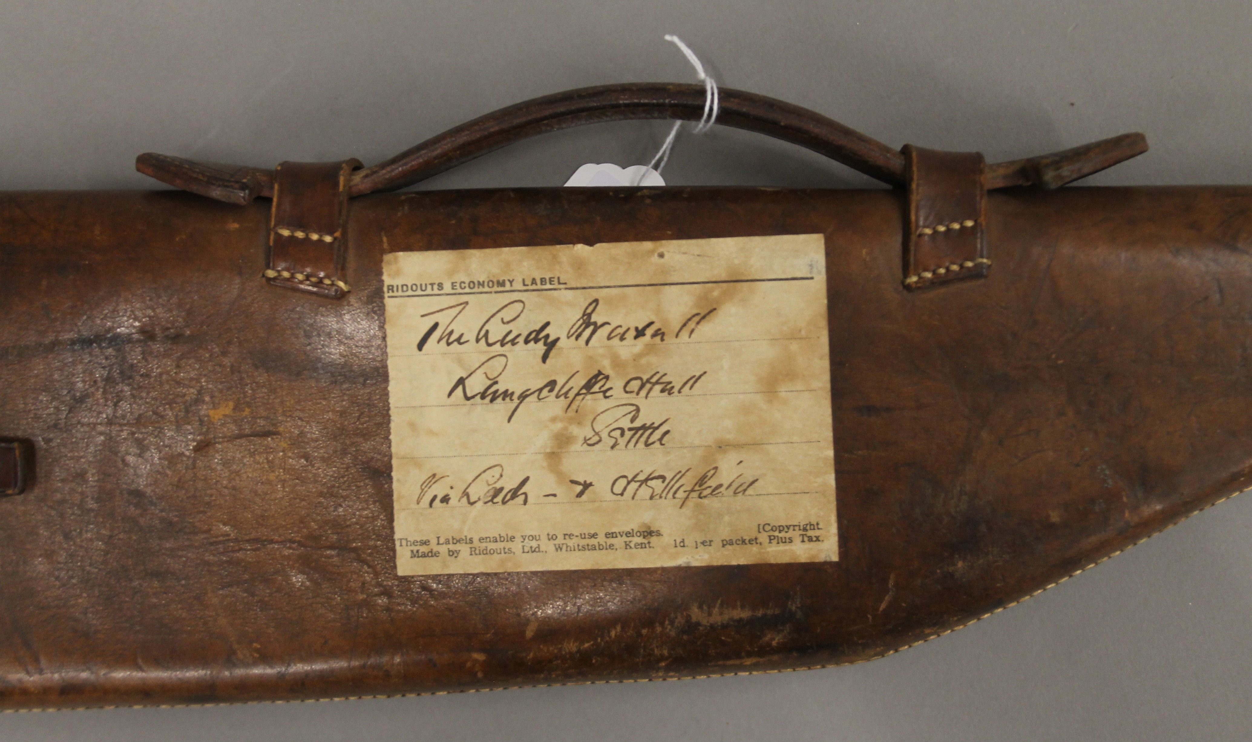 A small Victorian leather leg of mutton gun case with applied paper label, - Image 2 of 3