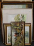 A quantity of paintings and prints.